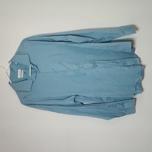 Clavin Klein blue button up shirt